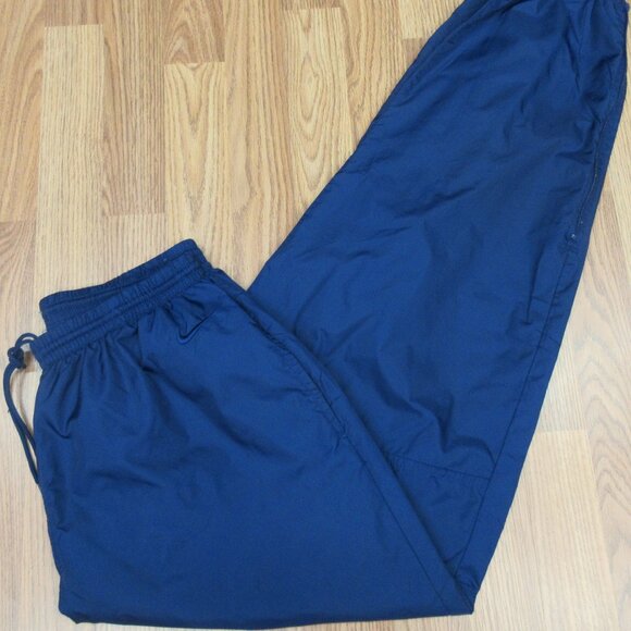 Navy blue nike windbreaker pants hotsell